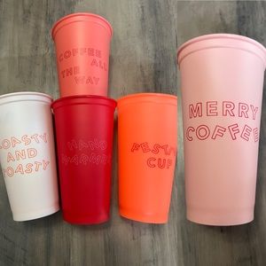 Five Starbucks cups